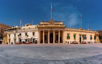 Aerial view of Lady of Mount Carmel church, St.Paul's Cathedral in Valletta embankment city center, Malta.