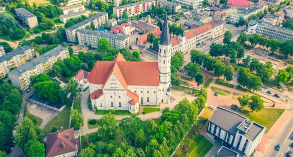 Beautiful Aerial view photo from flying drone panoramic on Siauliai and the city church on a sunny summer day Siauliai, Lithuania. (series)