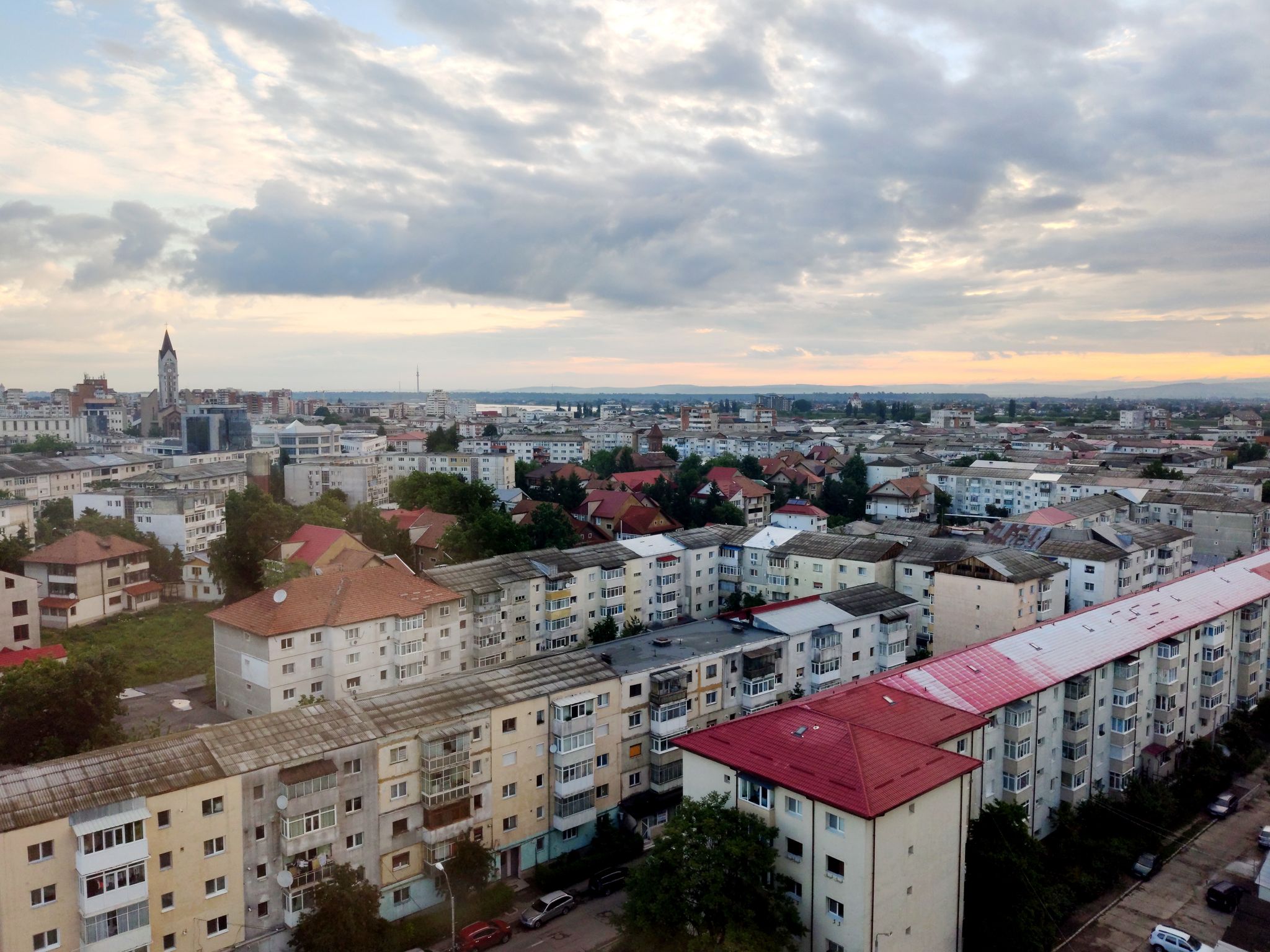 photo of view of Sunrise over the city of Bacău, in Romanian Moldova.