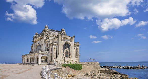 Beautiful summer landscape with Old Casino, symbol of the Constanta city, Romania.