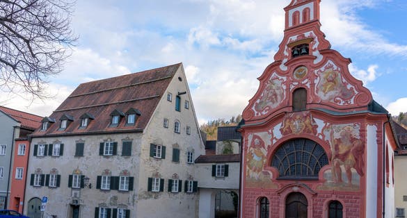 photo of view of Beautiful colorful romantic city of Füssen Germany with decorated houses