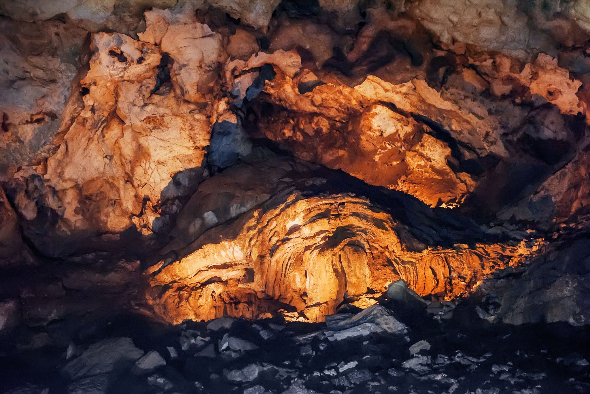 Photo of stalactites and stalagmites in Lipa Cave, formations Columns and Draperies, Montenegro.
