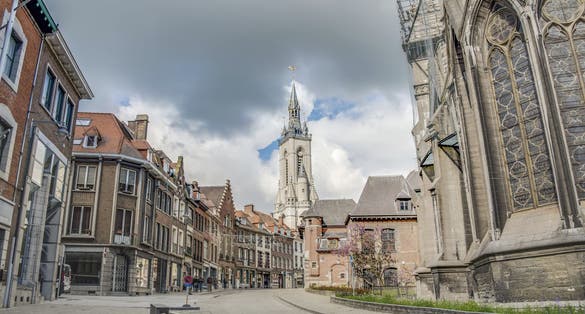 Photo of the oldest belfry in Belgium, a freestanding bell tower of medieval origin, 72 metres in height with a 256-step stairway in Tournai.