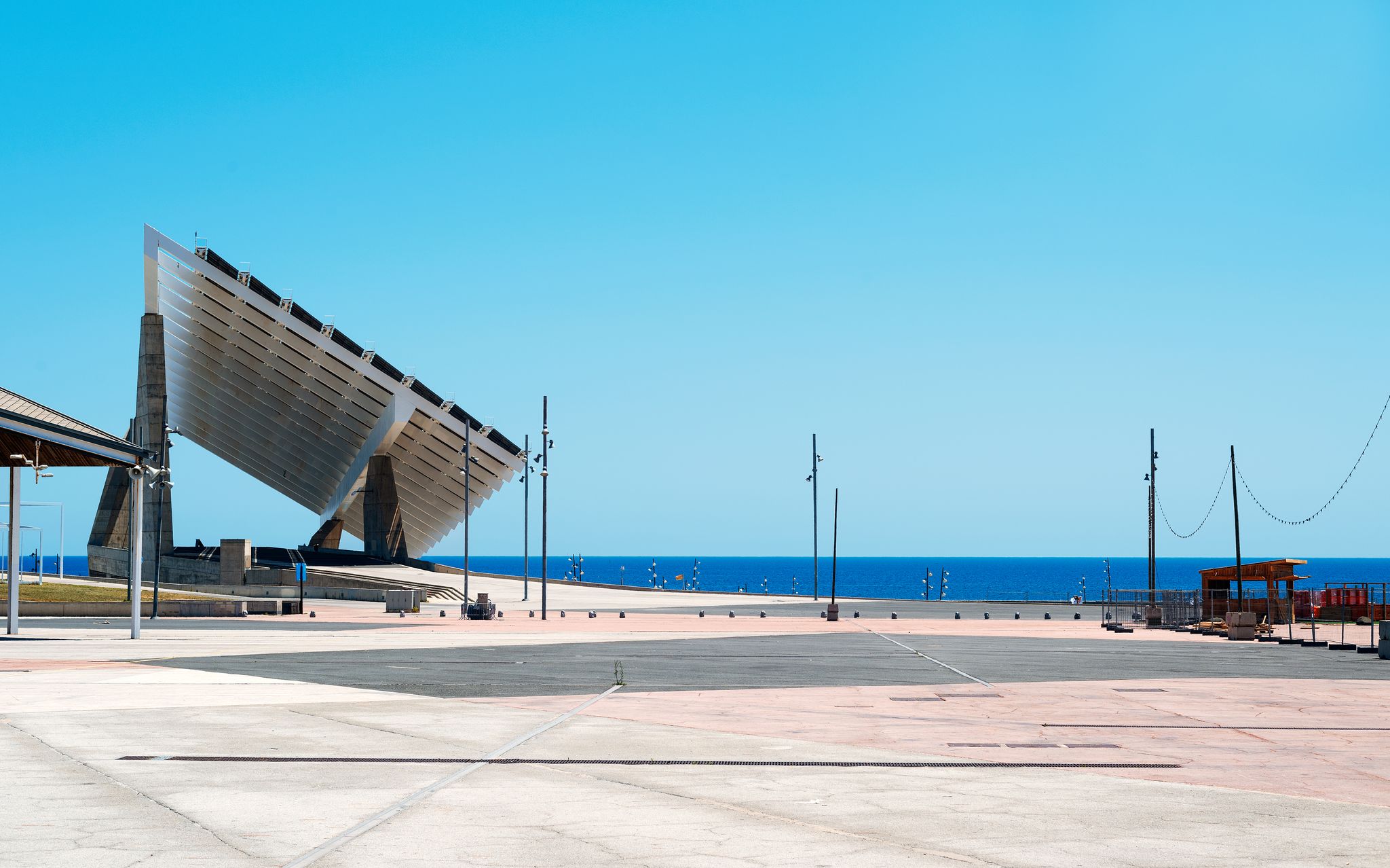 Photo of a view over the Parc del Forum public park in Barcelona, Spain, highlighting the giant sculptural photovoltaic panel .