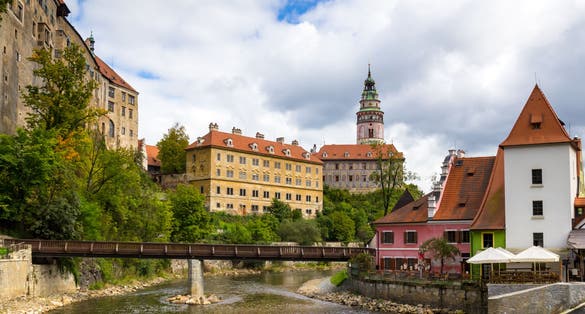 Photo of Wooden bridge over river Vltava, Český Krumlov, Czech Republic.