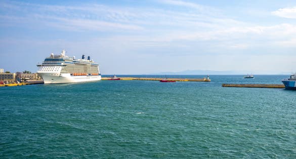 Photo of Impressive cruise ship at the port of Piraeus, Athens, ready to sail to the greek islands.