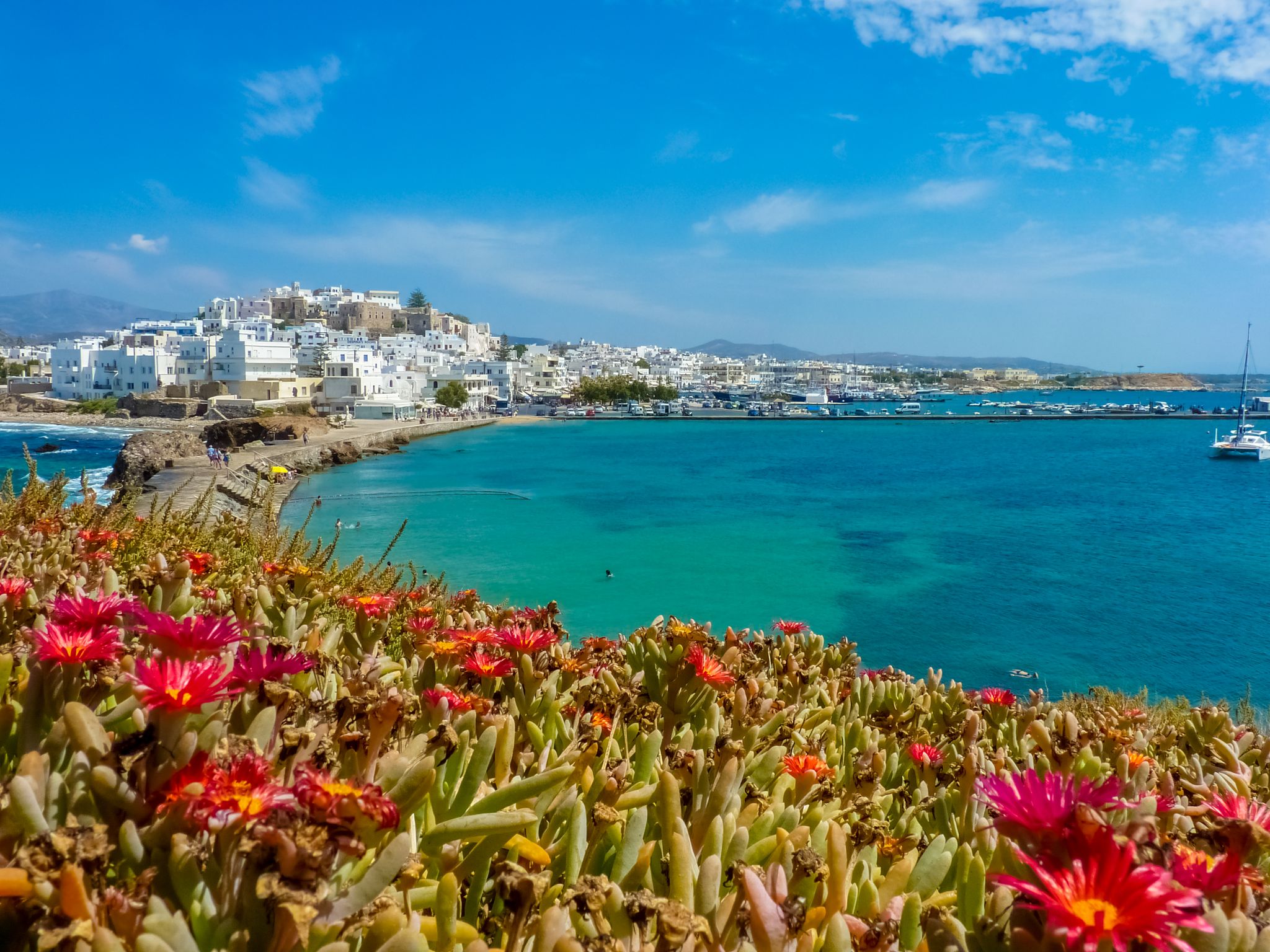 Photo of Chora with beach view, the capital of Naxos island, Cyclades, Greece.