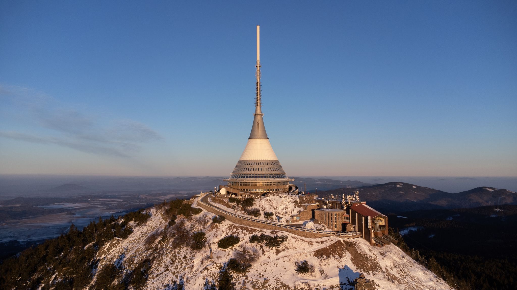 Photo of aerial view of snow-covered Jested, Liberec, Czech Republic.