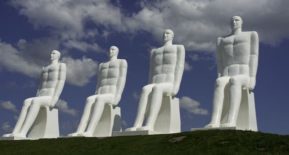 PHOTO OF VIEW OF Men at sea in Esbjerg, Denmark.