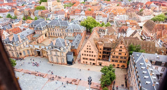 photo of aerial cityscape view on the old town with Place du Château (Chateau square) in Strasbourg city in France.