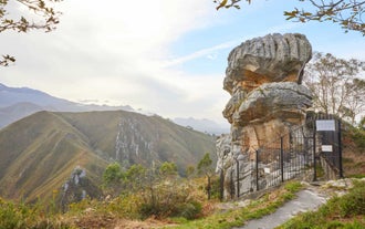 Photo of Ballota beach with the islet Castro, Llanes,  Spain.
