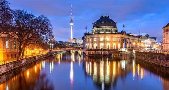 Pretty night time illumination of the museum island in Berlin Germany.