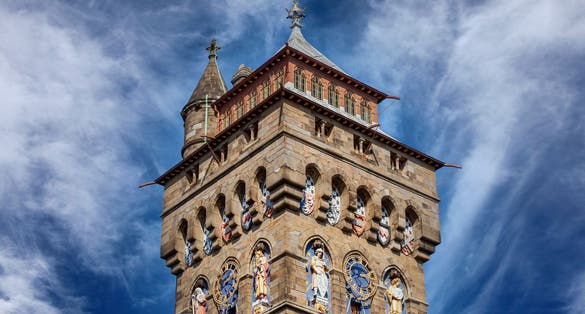 The clock tower of Cardiff Castle Wales UK completed in 1873 which is part of the wall of the 12th century.