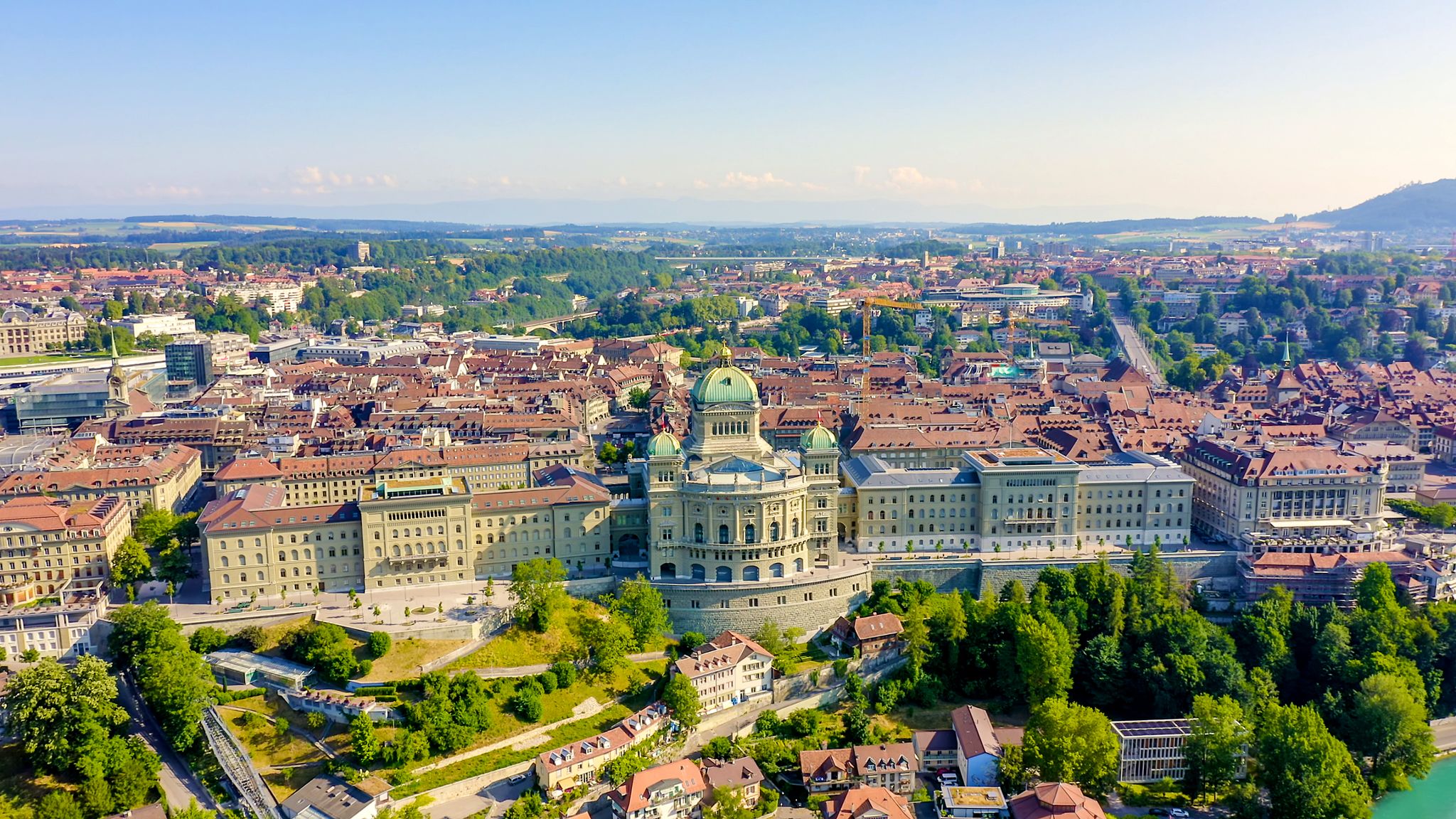 photo of aerial view of the Federal Palace of Switzerland in Historic city center in Bern, Switzerland.
