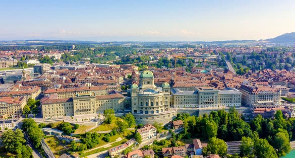 photo of aerial view of the Federal Palace of Switzerland in Historic city center in Bern, Switzerland.
