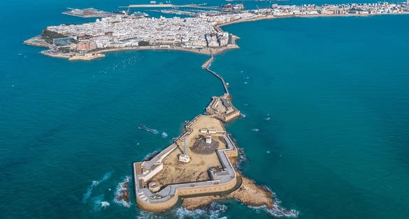 Aerial view of the city of Cadiz and the Castle of San Sebastian..