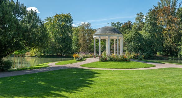Photo of circular temple, known as Temple of Love, Parc de l'Orangerie in Strasbourg, France.