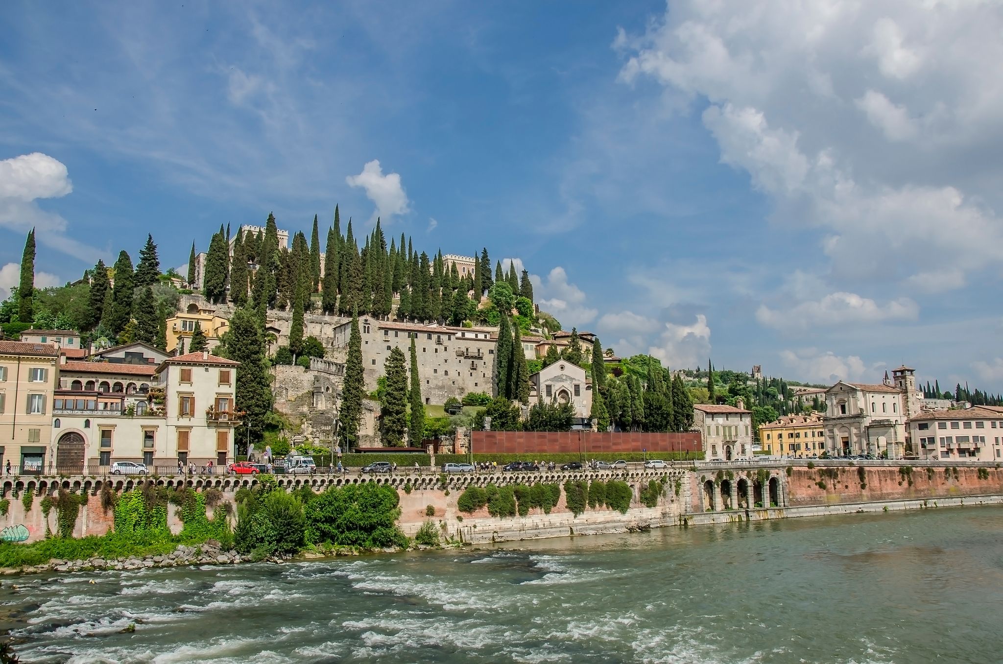 photo of View of the Roman Theater and river in Verona, Italy. View of Roman Theater Archaeological Museum (Museo Archeologico al Teatro Romano) and St. Pietro castle (Castel San Pietro) in Verona