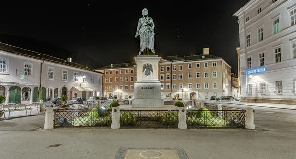 photo of view of Mozart statue on Mozart Square (Mozartplatz) located at Salzburg, Austria.