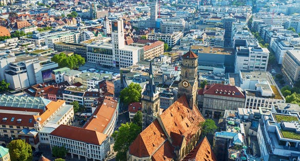 The Stiftskirche (Collegiate Church) is an inner-city church in Stuttgart, the capital of Baden-Wurttemberg, Germany. View from above with the town buildings