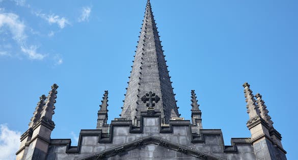 Photo of the Sheffield Cathedral roof with the pinnacles and the high spire, England.