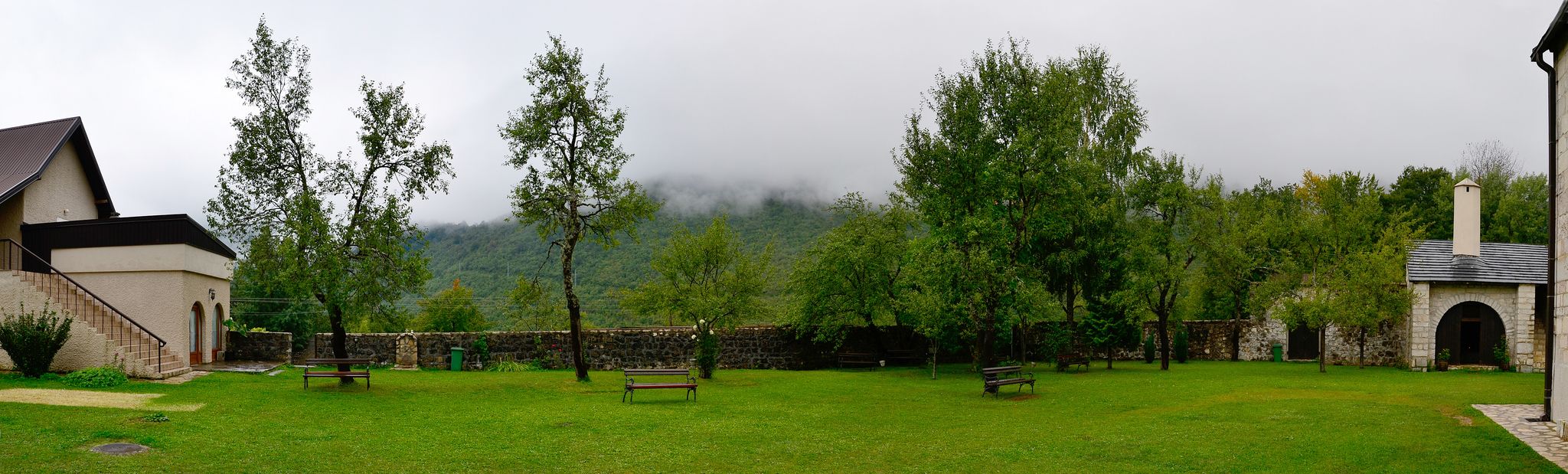 Piva Monastery courtyard on rainy day, Montenegro.