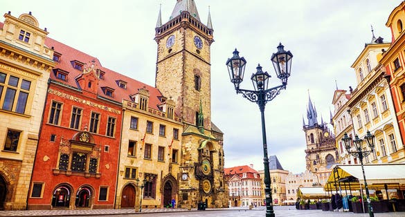 Photo of Prague Old Town Square Czech Republic, sunrise city skyline at Astronomical Clock Tower.
