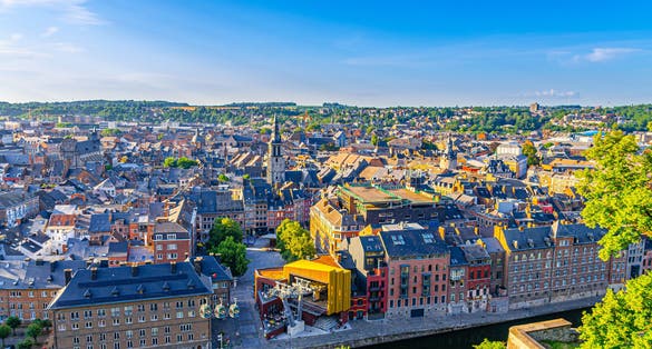 photo of view of  Namur cityscape, aerial panoramic view of old town Namur city historical center with Sambre river embankment, skyline panorama of Namur fields on horizon, Wallonia, Walloon Region, Belgium