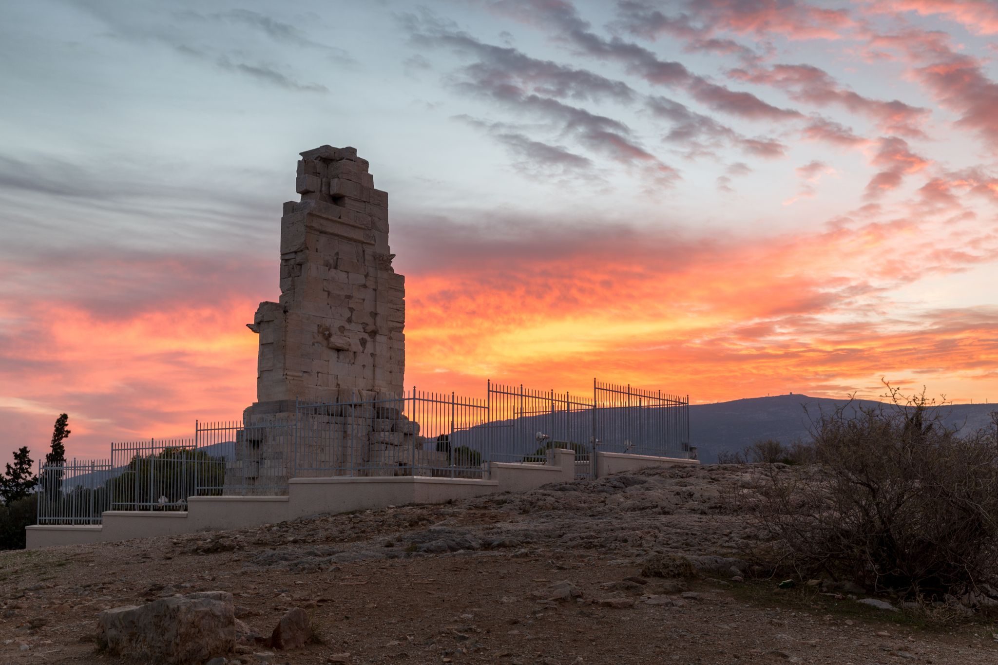photo of view of Sunrise over Philopappos Monument, Athens, Greece.