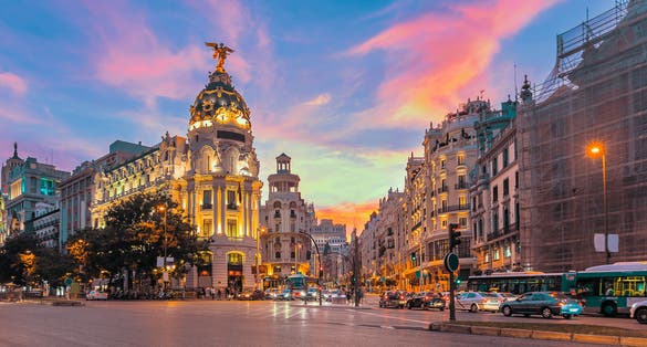 Photo of Madrid city skyline gran via street twilight , Spain.