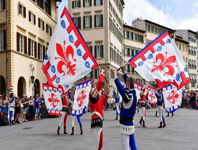 Flag bearers performing in traditional costume during the Feast of St. John the Baptist in Florence..jpg