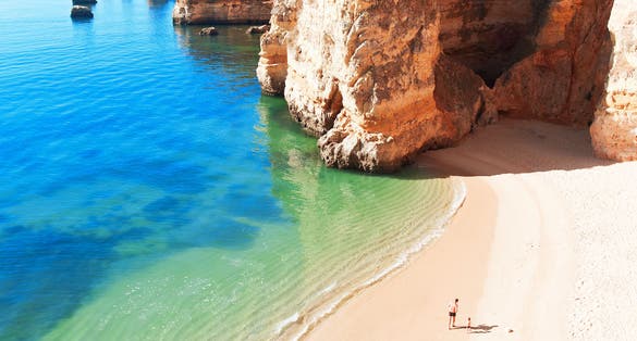 Photo of Coastal cliffs (Ponta da Piedade)with beautiful beach, Lagos, Portugal.