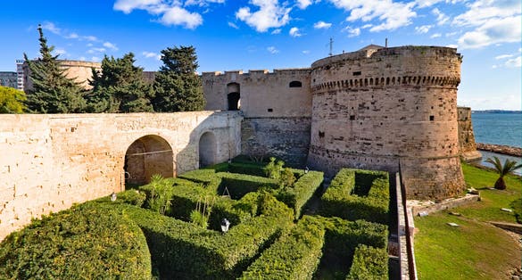 photo of Taranto Aragonese castle tower on the sea, Puglia, Italy.