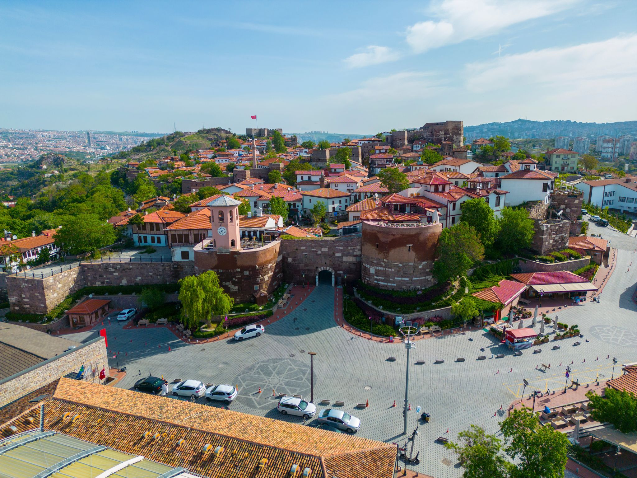 photo of Ankara Castle main gate with tower and historic residential buildings aerial view. The castle is an historic fortification in Altindag district in city of Ankara, Turkey.