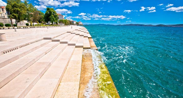 Photo of Zadar sea organs. Tourist attraction musical instrument powered by the underwater sea stream. Dalmatia region of Croatia.