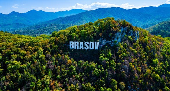 Carpathians mountains, Brasov sign on the hill, Brasov, Romania.