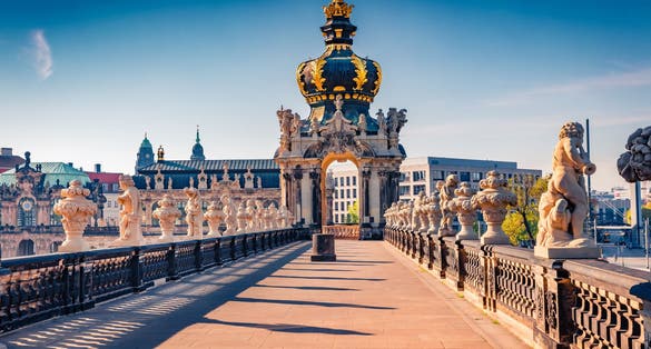 Photo of adorable morning view of popular historical landmark Kronentor (crown gate) in Zwinger palace (Der Dresdner Zwinger) Art Gallery of Dresden.