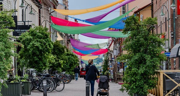 A mother moving her baby's cart in Östersund, Sweden.
