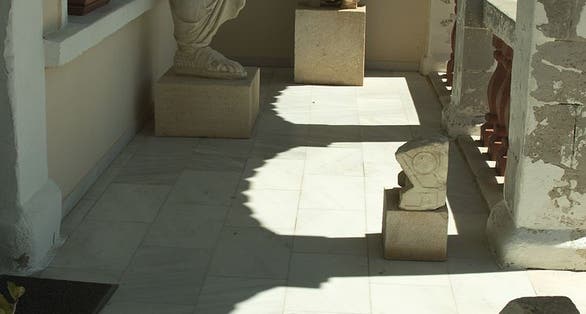 photo of Archaeological Museum of Milos, Lapidary in porch of the building, Plaka, Greece.