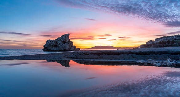 Photo of Spectacular sunset at Penon del Cuervo. Costa del Sol, Malaga, Spain.