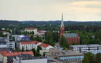 Photo of aerial view of beautiful landscape of lakes and forest in Imatra, Finland.