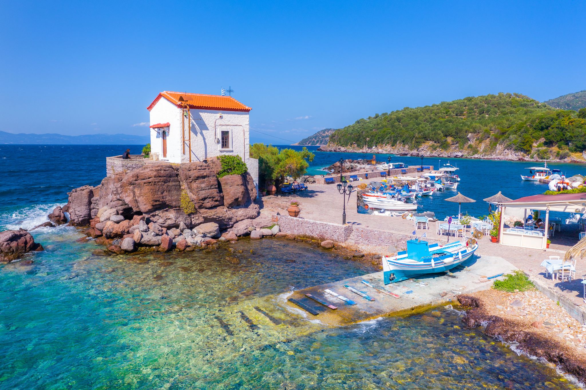 Photo of the little church of Panagia gorgona situated on a rock in Skala Sykamias, Mytilene.
