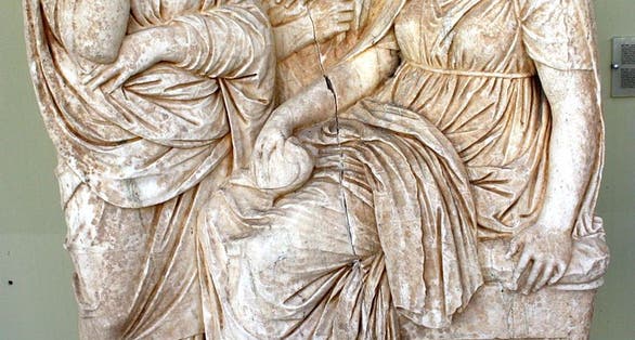 photo of view Funerary relief for a girl, flanked by her parents, Municipality of Piraeus, Greece.