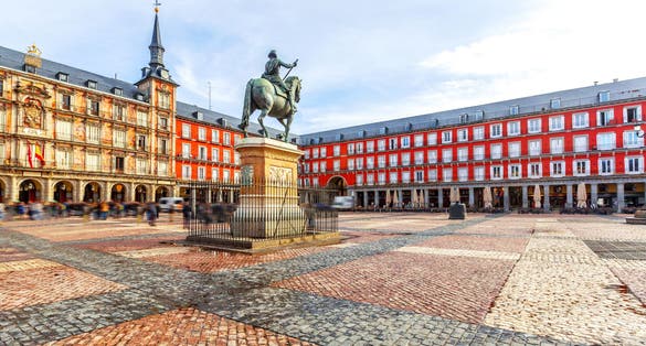 Photo of Plaza Mayor with statue of King Philips III in Madrid, Spain.