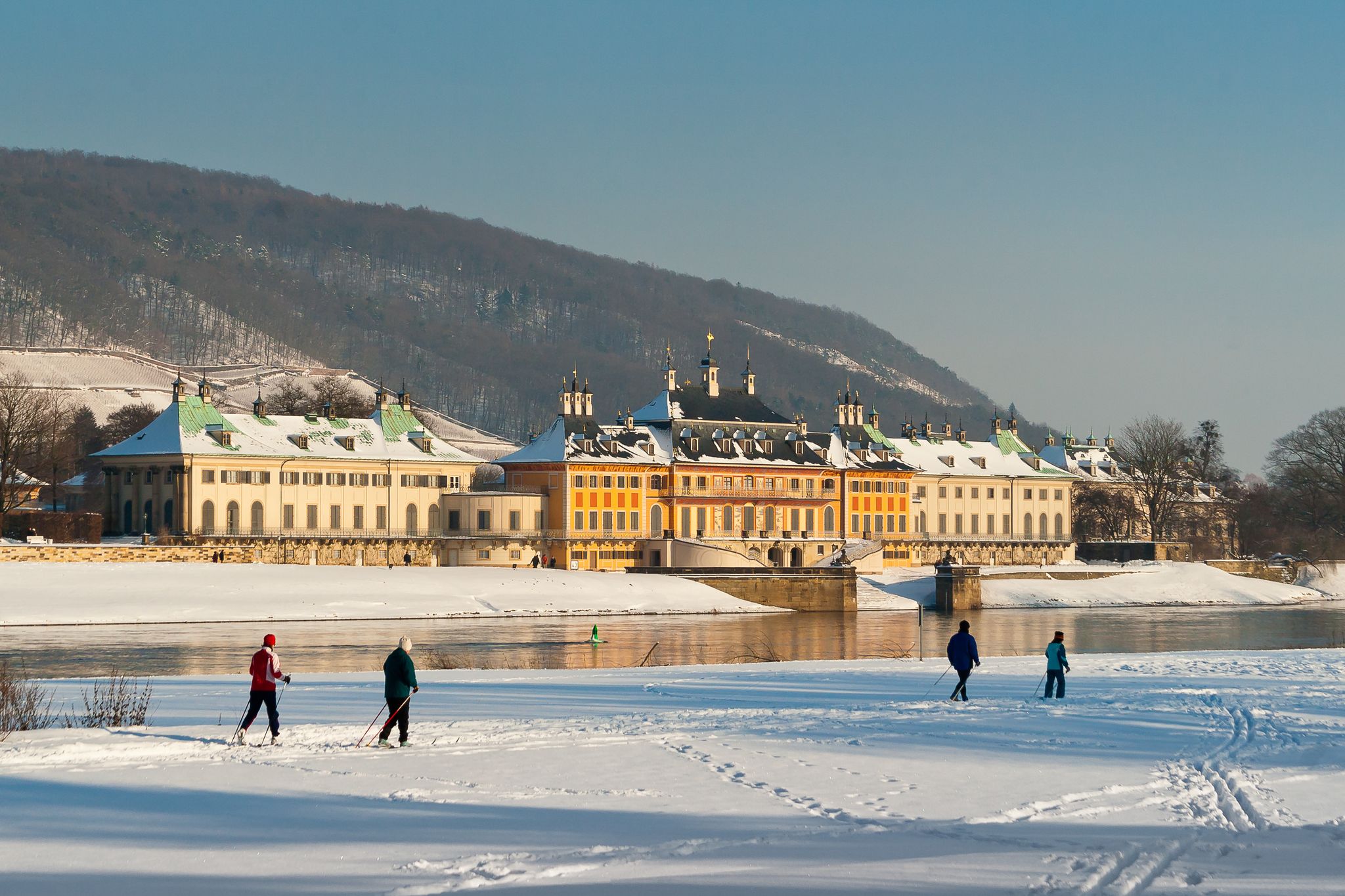 Pillnitz Castle in Dresden on the river Elbe in winter with snow