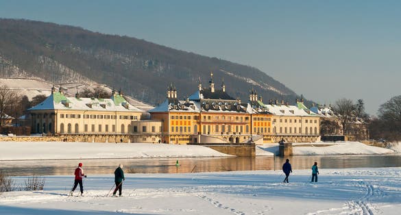 Pillnitz Castle in Dresden on the river Elbe in winter with snow
