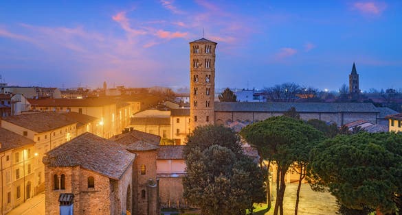 photo of view Ravenna, Italy old historic skyline with the Basilica of Sant' apollinare Nuovo bell tower. Ravenna, Italy.