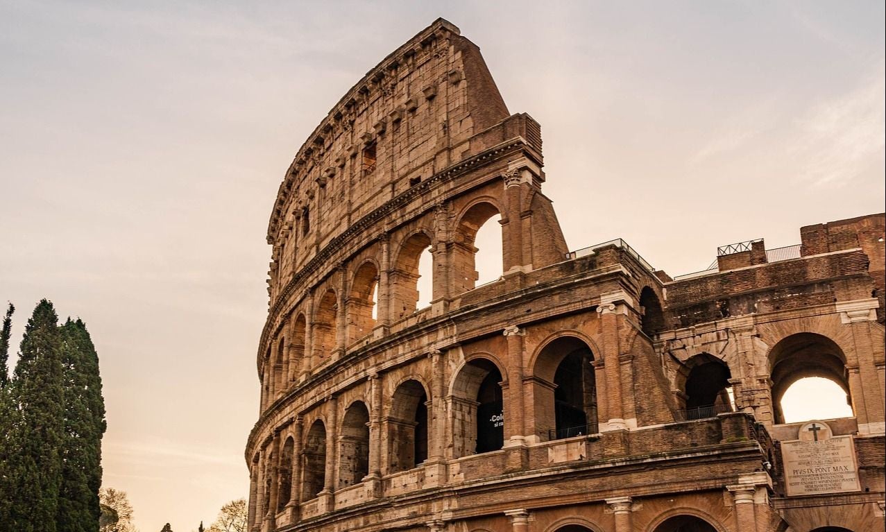 Early morning view of the Colosseum in Rome, a must-see landmark when visiting Italy in June..jpg