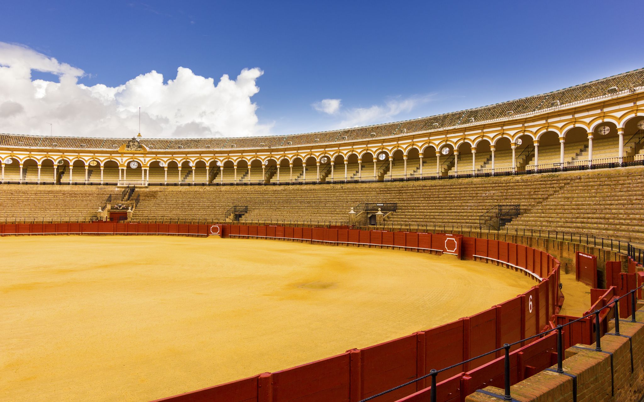 Photo of Bullfight arena, plaza de toros in Seville,La Maestranza, Spain .
