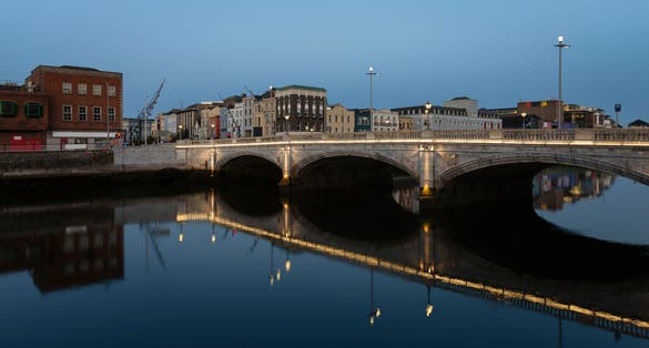 photo of view of St Patrick's Bridge at night in Cork City, Ireland.